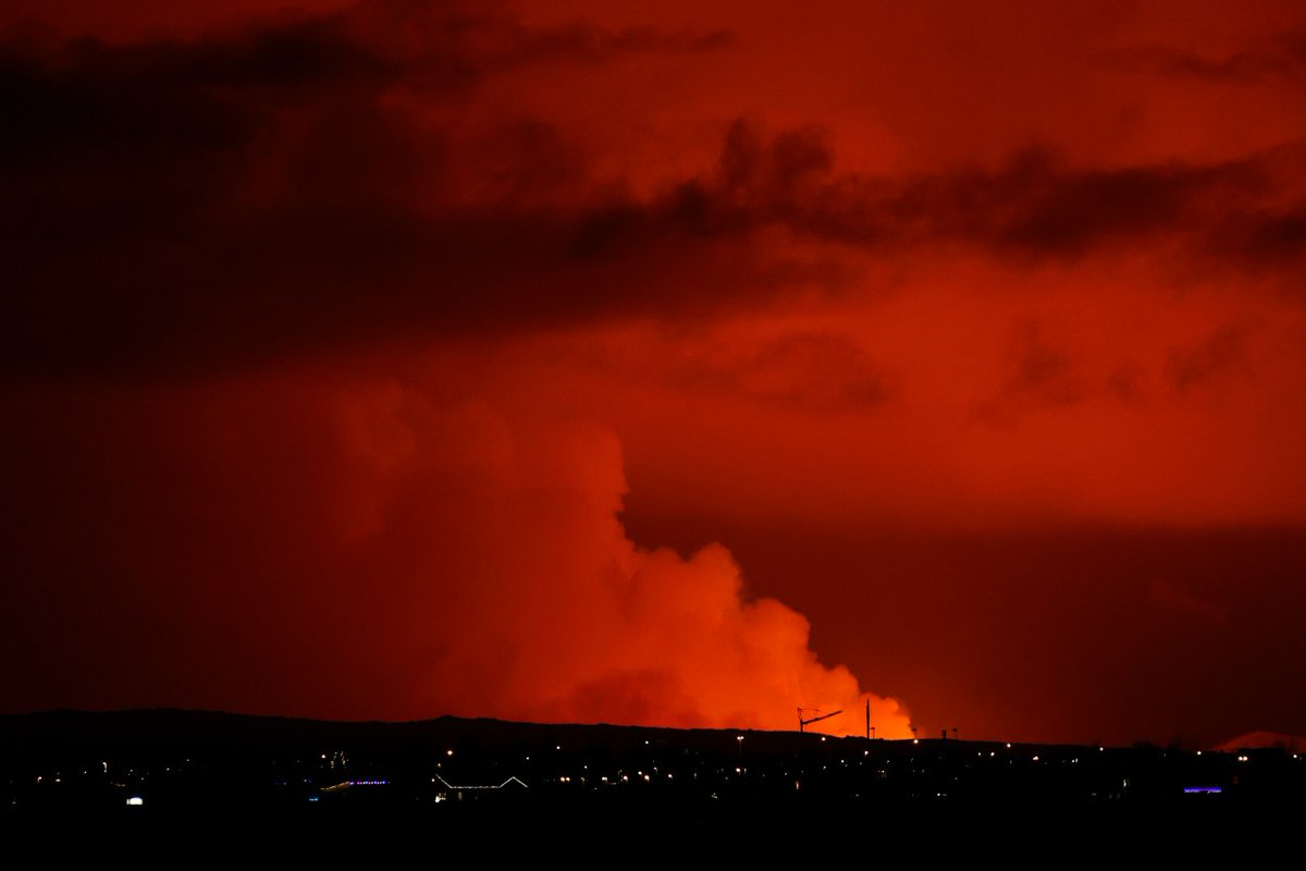 A volcanic eruption started Monday night on Iceland's Reykjanes Peninsula, turning the sky orange and prompting the country's civil defense to be on high alert
